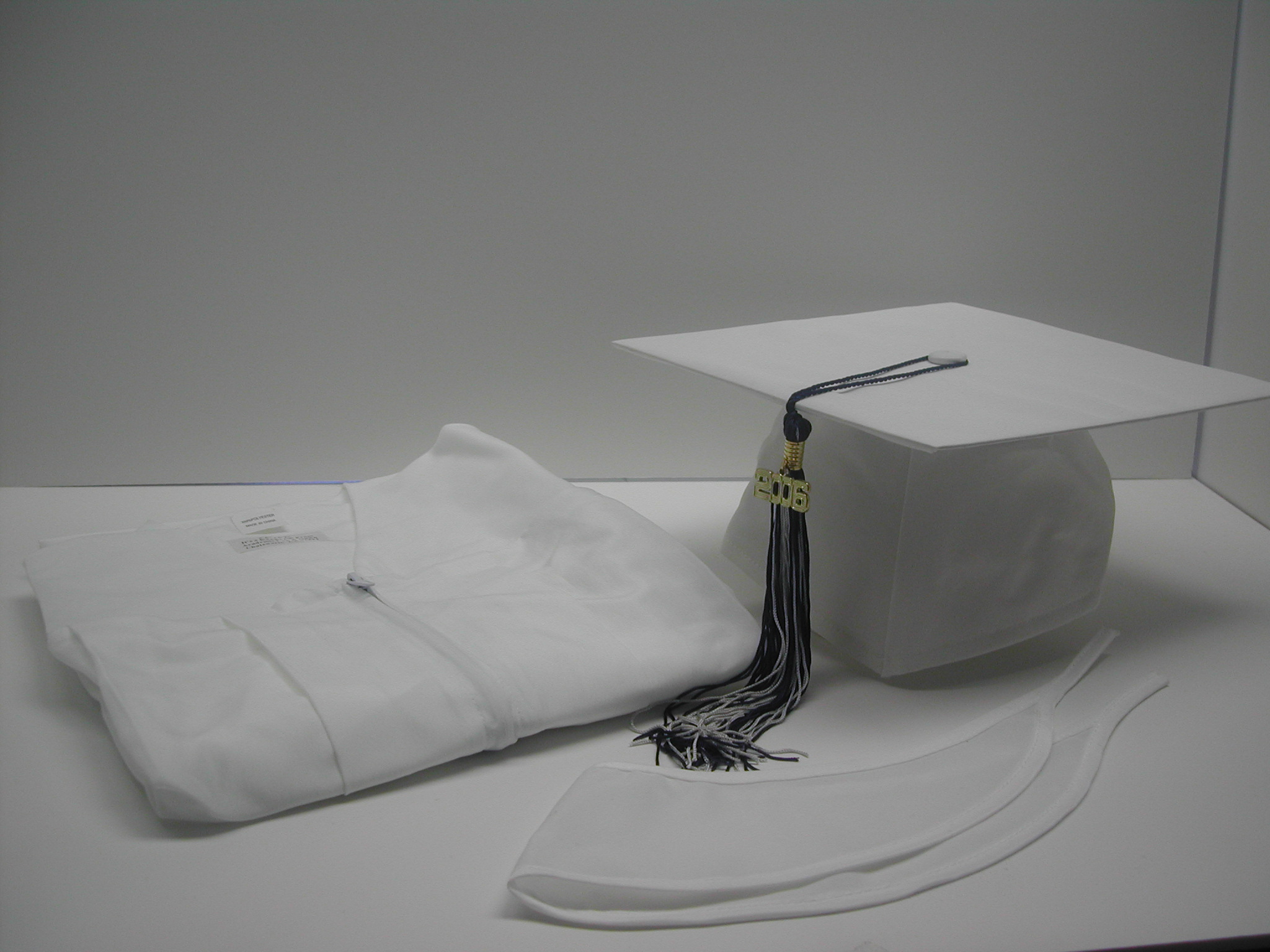 white graduation gown